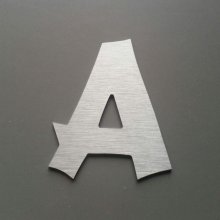 Geborstelde metalen letter CANCUN