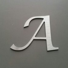 Geborstelde metalen letter LUCIDA CALLIGRAPHY
